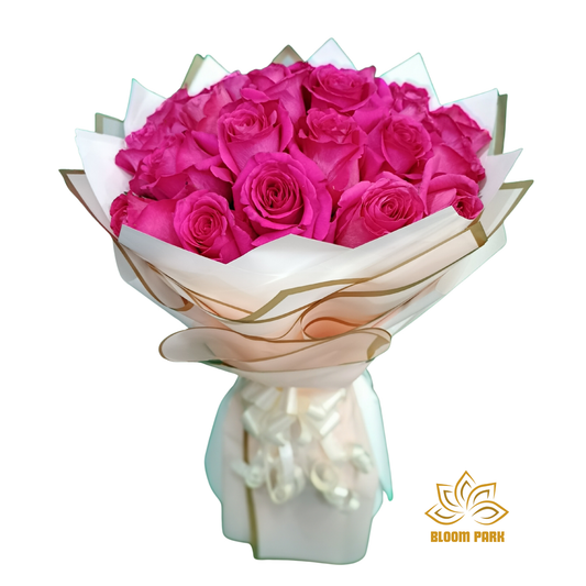 Bouquet of pink roses wrapped in white paper with gold accents, fresh flowers delivery Dubai.