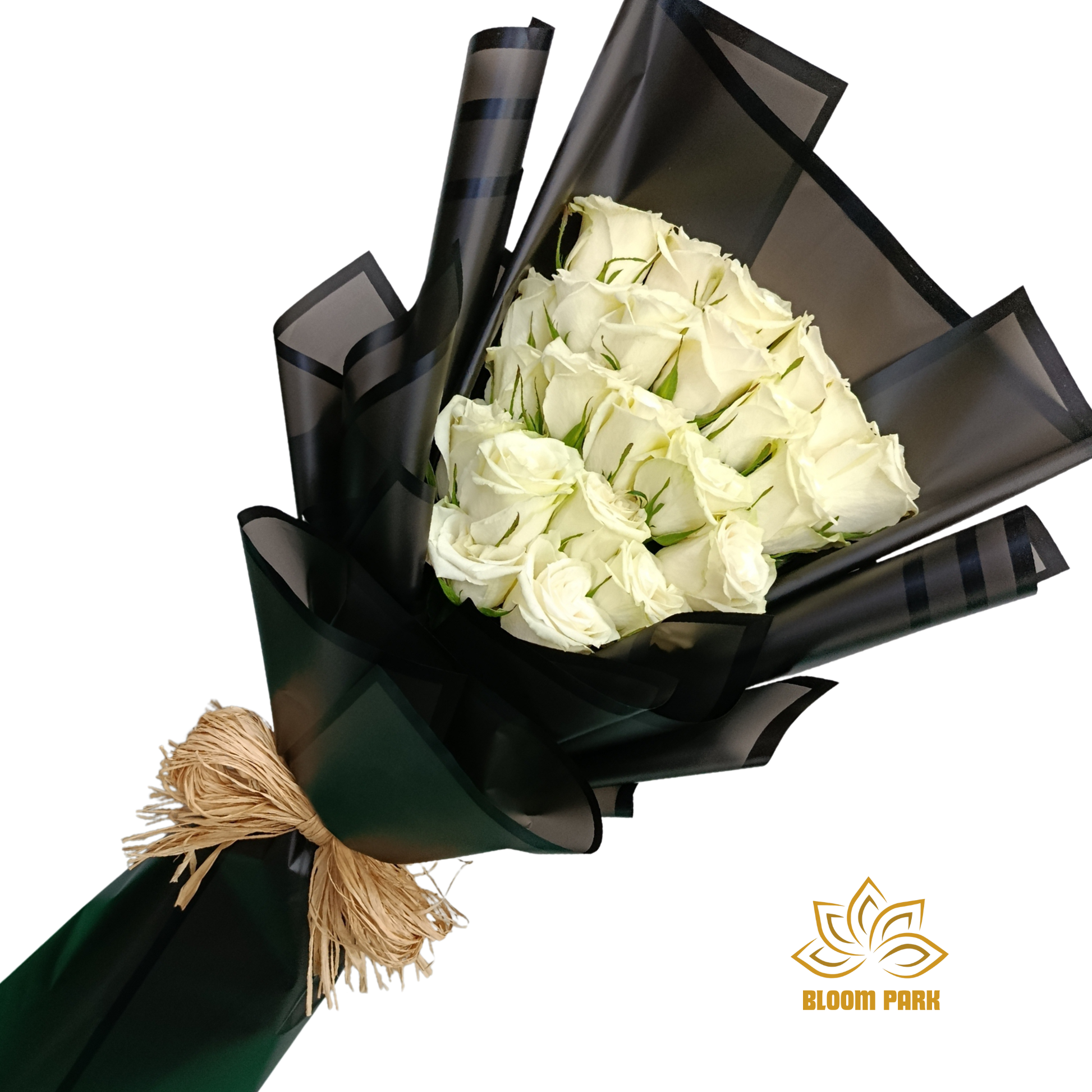 Bouquet of white roses wrapped in black paper with a decorative bow